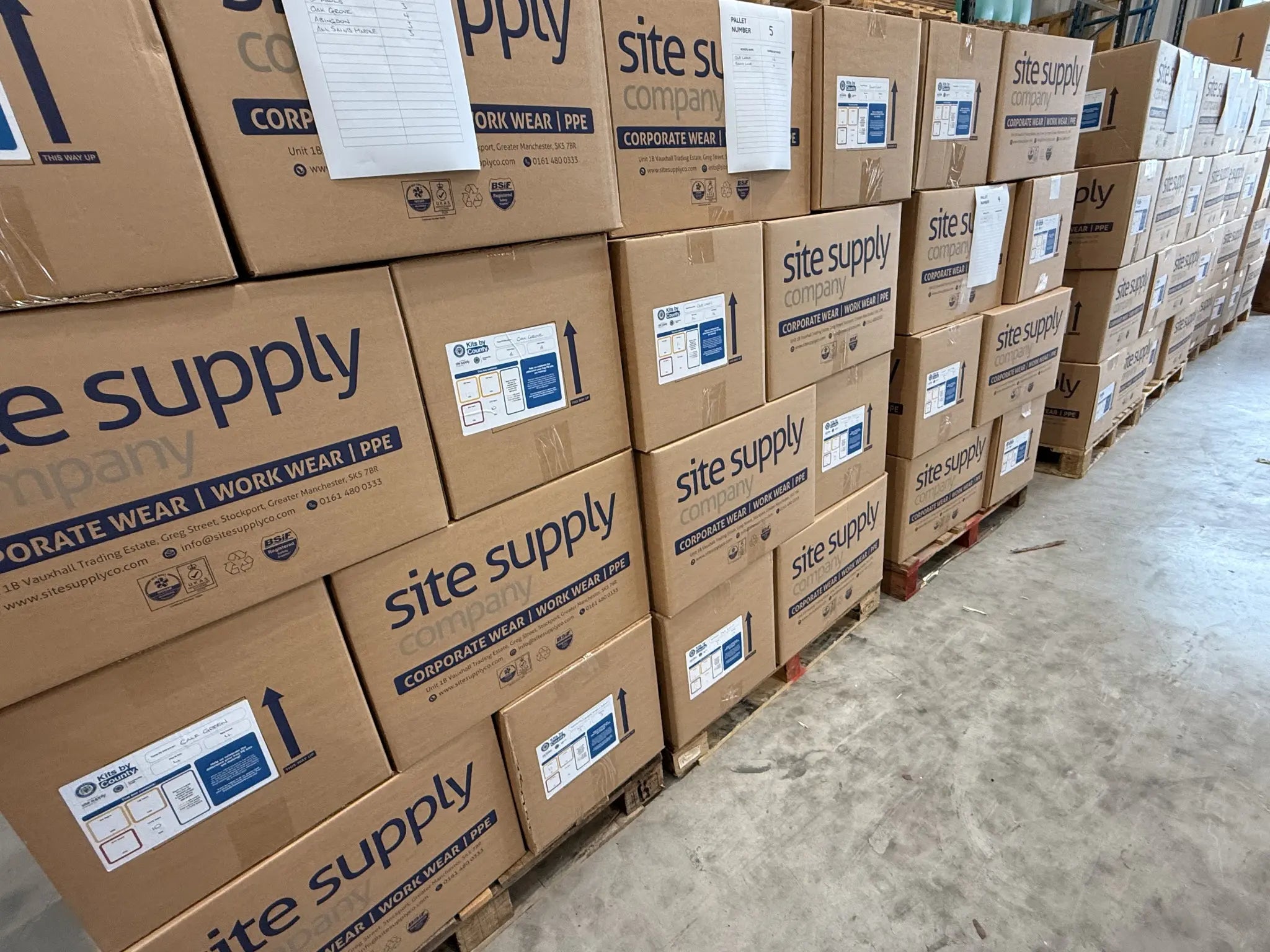 The Site Supply Company boxes labelled for Kits by County at our warehouse